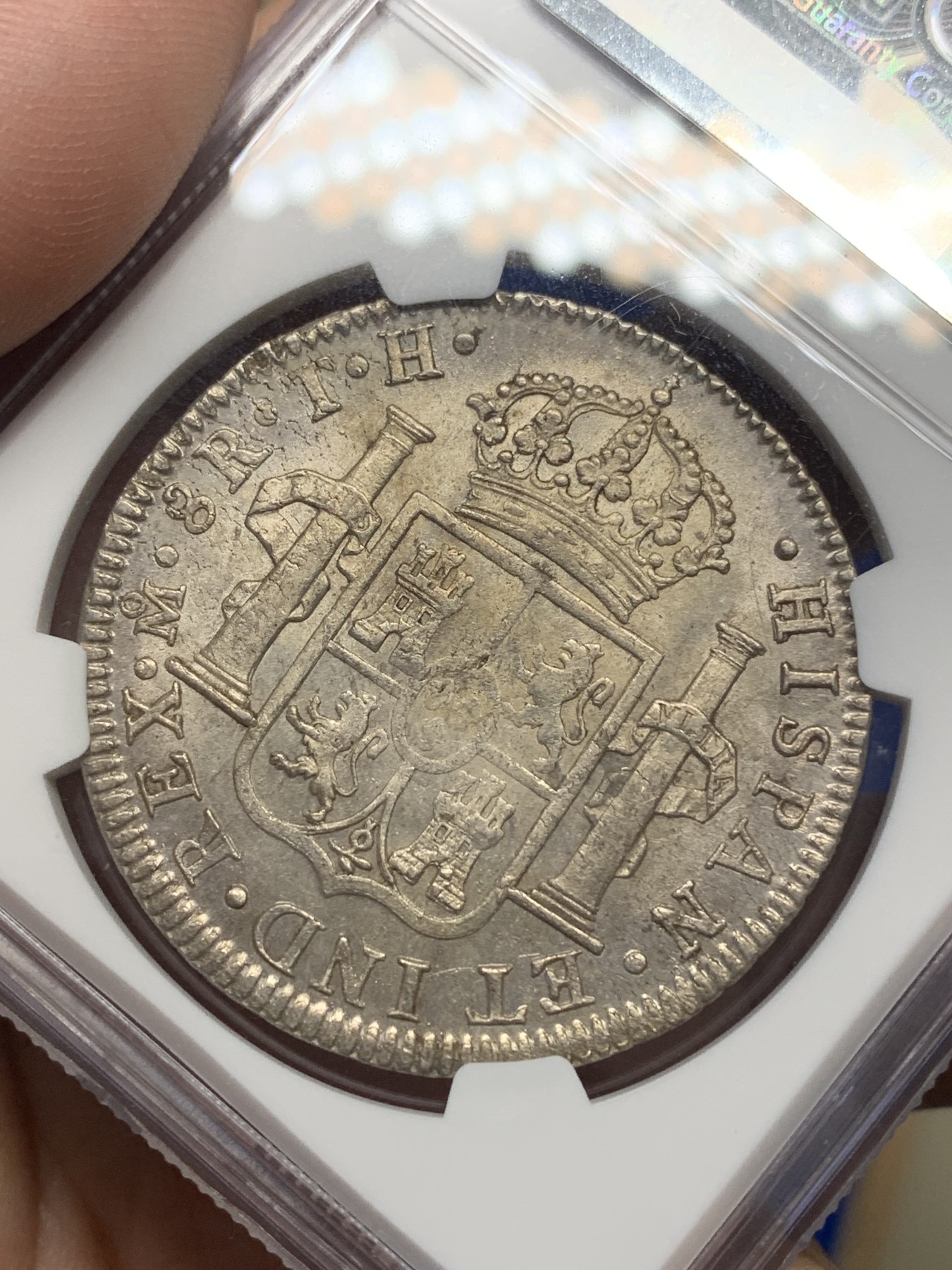 《竞宝斋》第196场-周日，周一 2场 (全场包邮) NGC-MS62 西属墨西哥1807 MO TH卡四 人像双柱 8瑞尔银币  双面淡彩