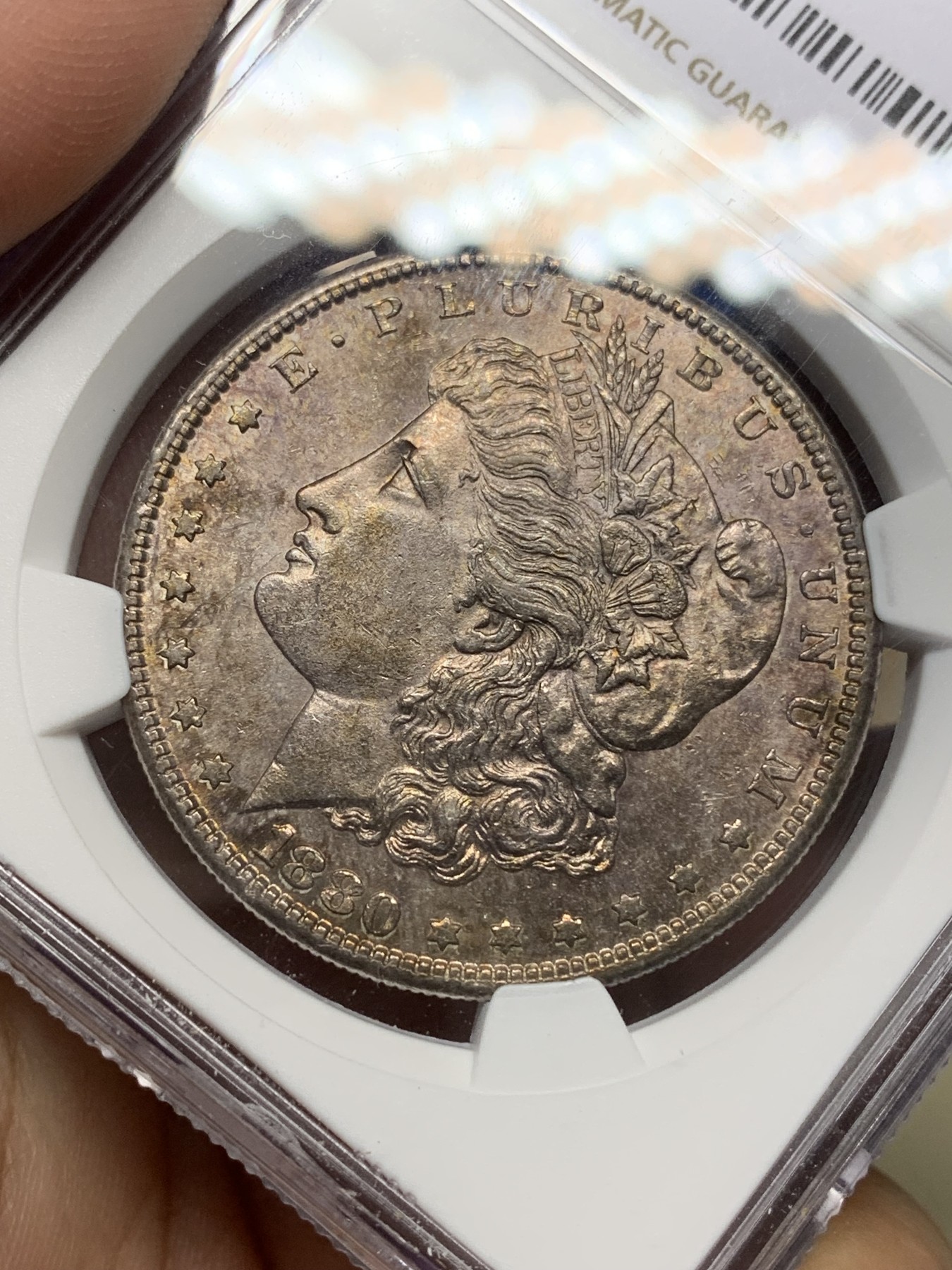 《竞宝斋》第196场-周日，周一 2场 (全场包邮) NGC-MS63 美国 1880年（S） 摩根银币 紫金彩包浆 状态非常不错