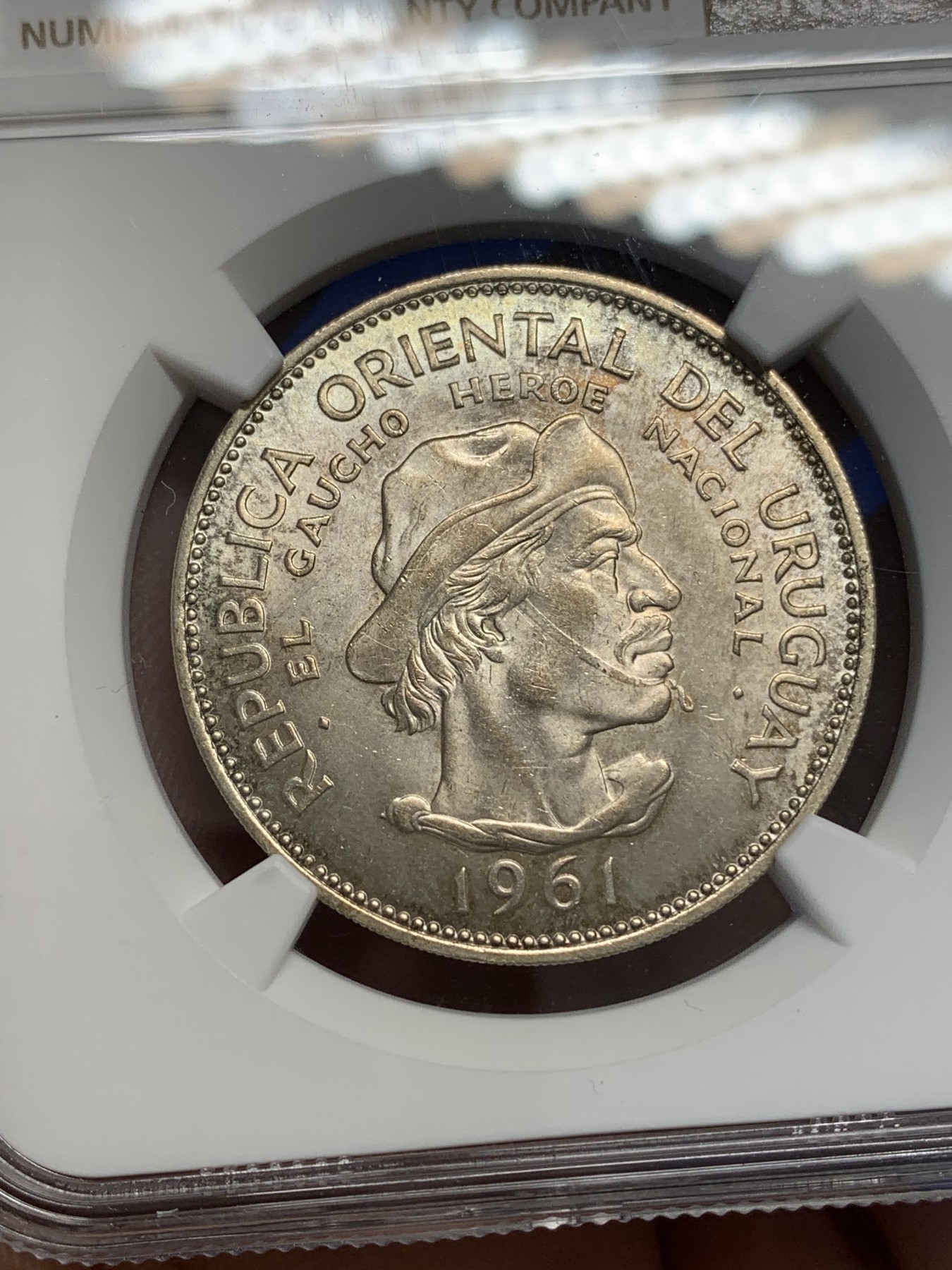 《竞宝斋》第196场-周日，周一 2场 (全场包邮) NGC MS64 乌拉圭1961年10比索银币 状态极好