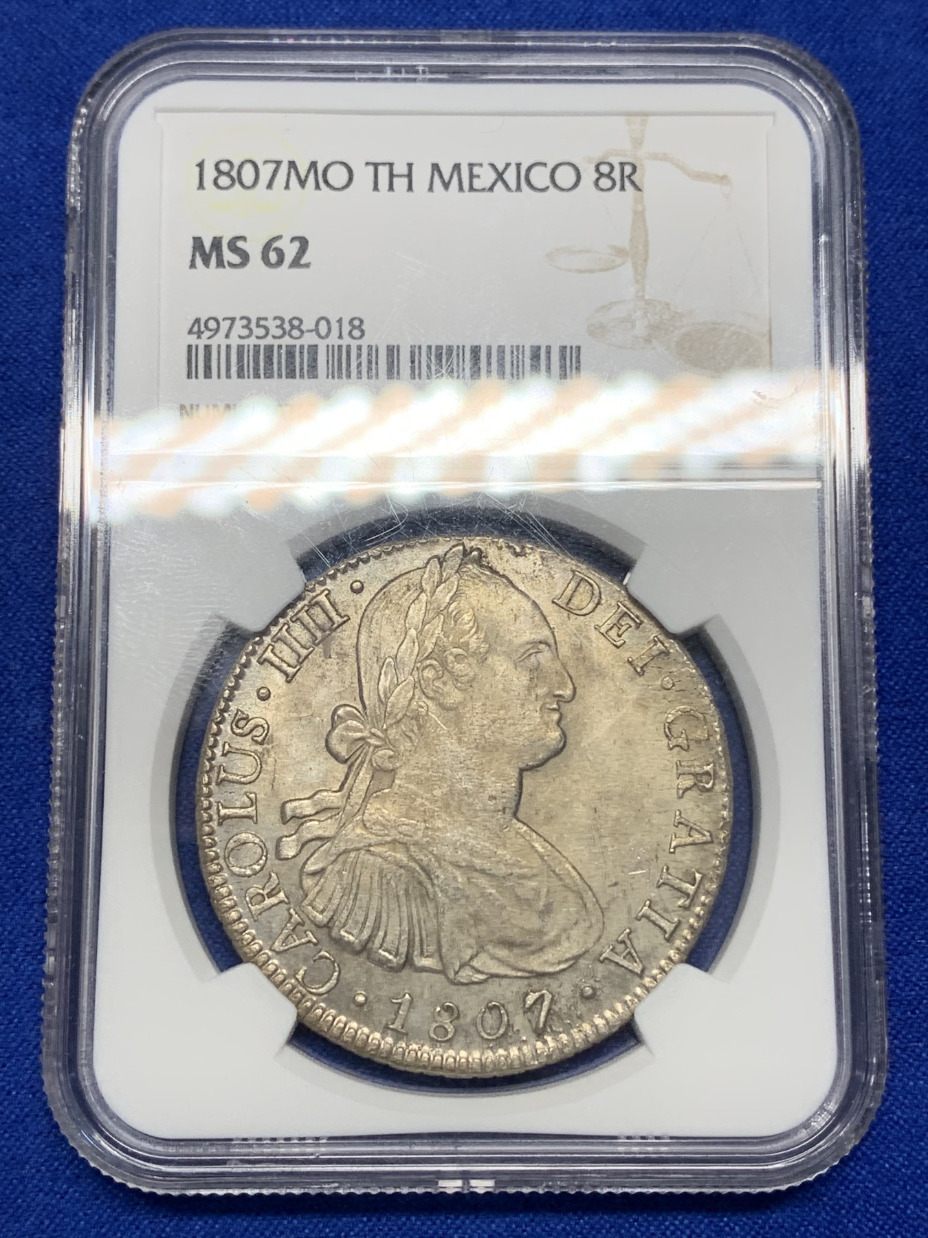 《竞宝斋》第196场-周日，周一 2场 (全场包邮) NGC-MS62 西属墨西哥1807 MO TH卡四 人像双柱 8瑞尔银币  双面淡彩