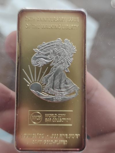 燕姐换藏第58拍 2010年一盎司局部镀金纪念银条