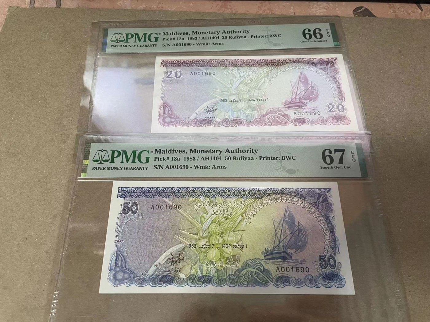 【Blue Auction】✨世界纸币精拍第370期——莫总专场XXIX 【一组7张 带原册 A冠1690倒置号全同】马尔代夫 1983-90年2-500拉菲亚 PMG67EPQ-64EPQ 精美 