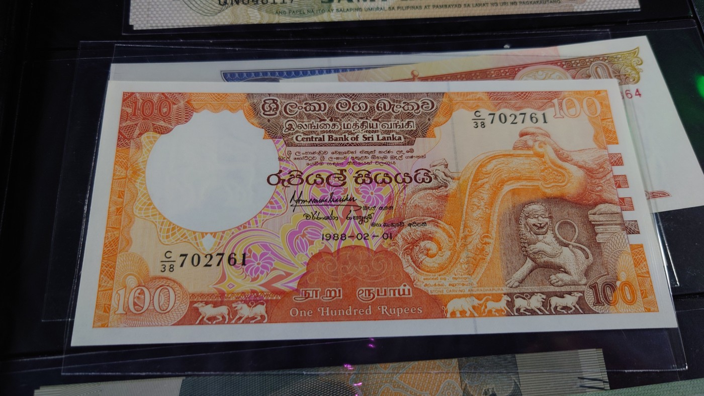 【世界钱币】精选微拍第69期暨2023年第十六期 多款纸币裸钞超低价起拍(第一场) 【售出】1988年斯里兰卡100卢比 全新绝品无斑 
