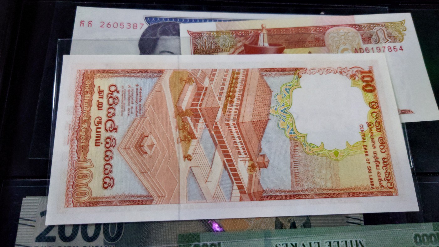 【世界钱币】精选微拍第69期暨2023年第十六期 多款纸币裸钞超低价起拍(第一场) 【售出】1988年斯里兰卡100卢比 全新绝品无斑 