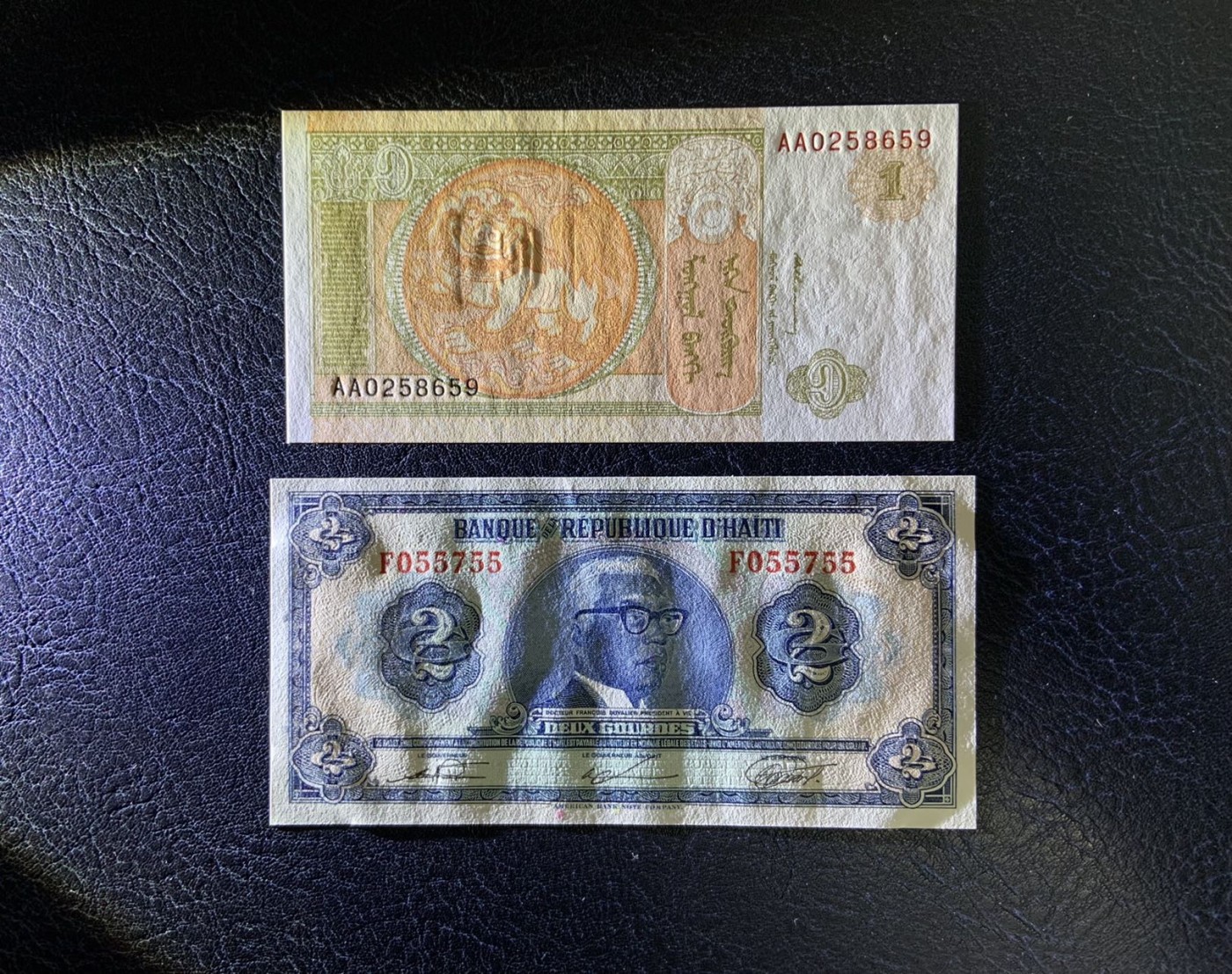 收藏联盟Quantum Auction 第289期拍卖  蒙古1993年1图格利特和海地1979年2古德 品相UNC 号码无347 海地角有轻微压痕 