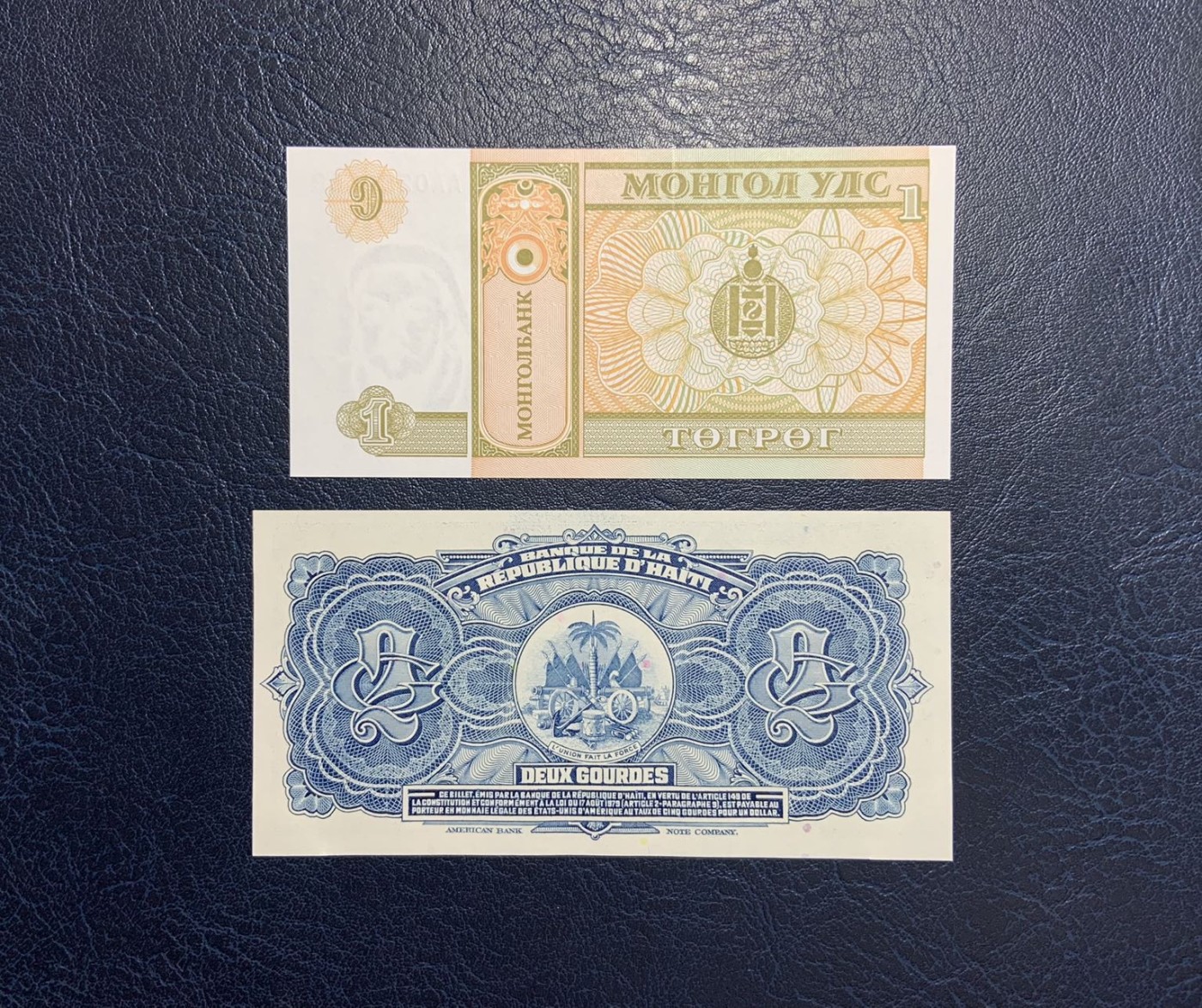 收藏联盟Quantum Auction 第289期拍卖  蒙古1993年1图格利特和海地1979年2古德 品相UNC 号码无347 海地角有轻微压痕 