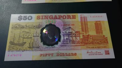 【世界钱币】精选微拍第70期暨2023年第十七期 多款塑料钞裸币超低价起拍 1990年新加坡50元塑料纪念钞 全程无47 首发A冠带年份