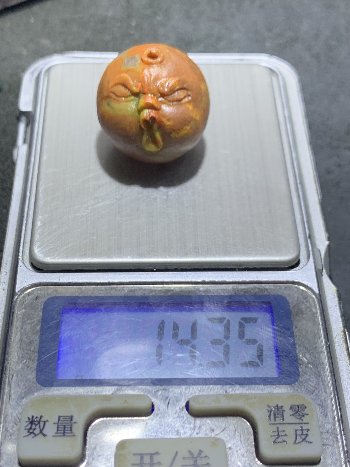 精美亚光高玉化战国红玛瑙手工雕刻怒目表情圆珠一个！