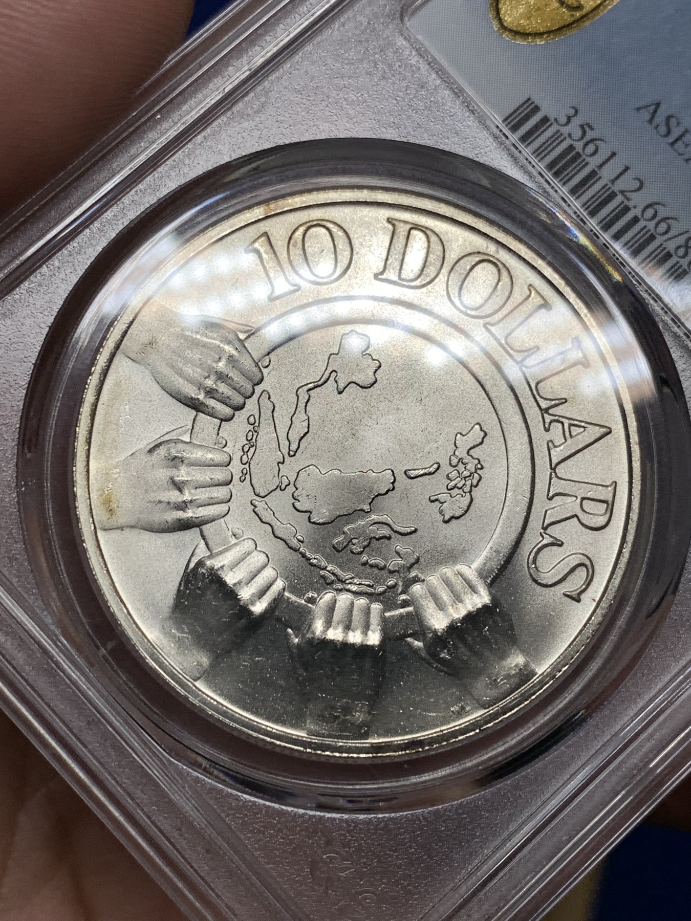 《竞宝斋》第198场-周日，周一 2场 (全场包邮) PCGS MS66 1977新加坡东盟10周年银币 原光好品