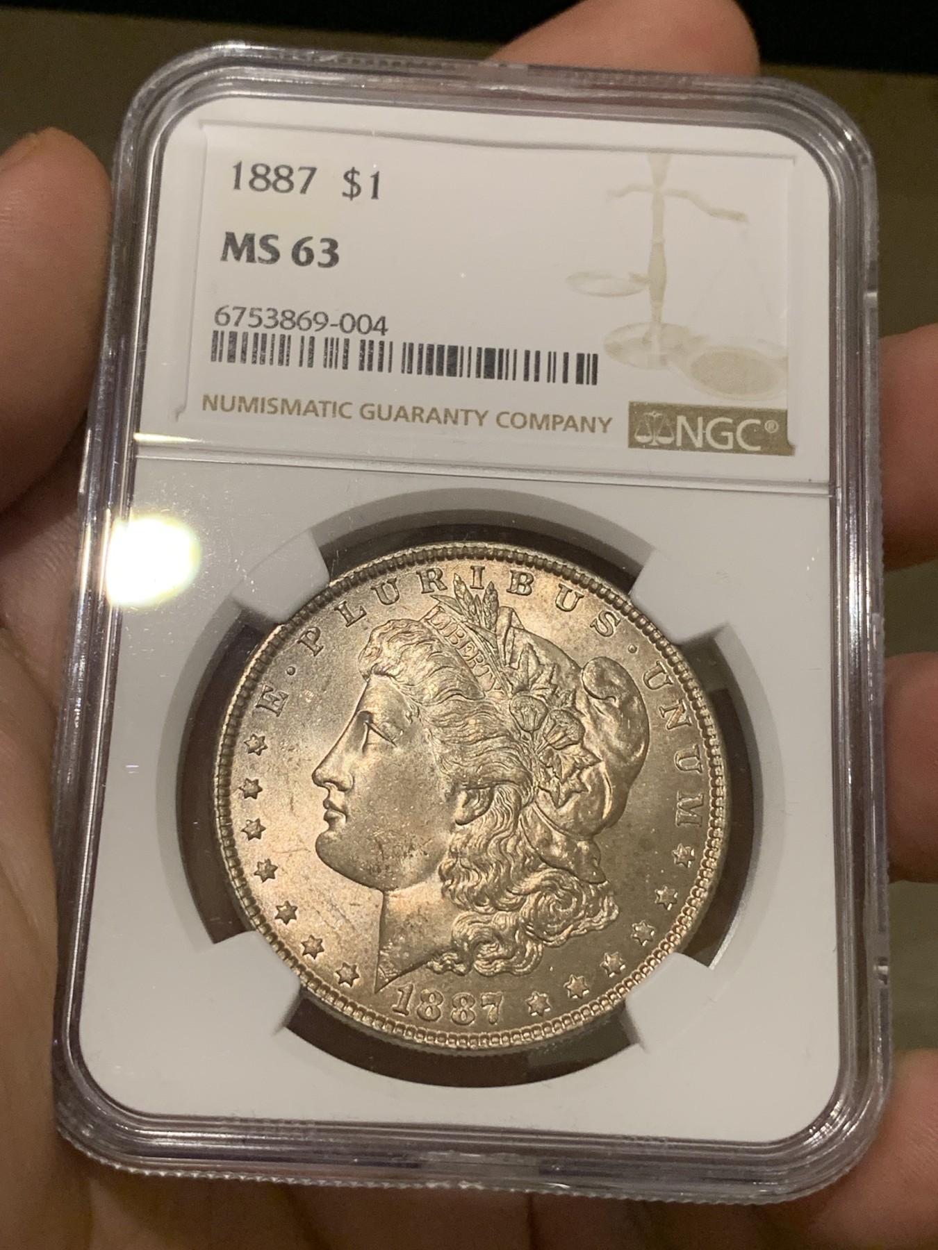 《竞宝斋》第198场-周日，周一 2场 (全场包邮) NGC-MS63 美国 1887年 摩根银币1美元 淡紫色包浆 转光感强烈