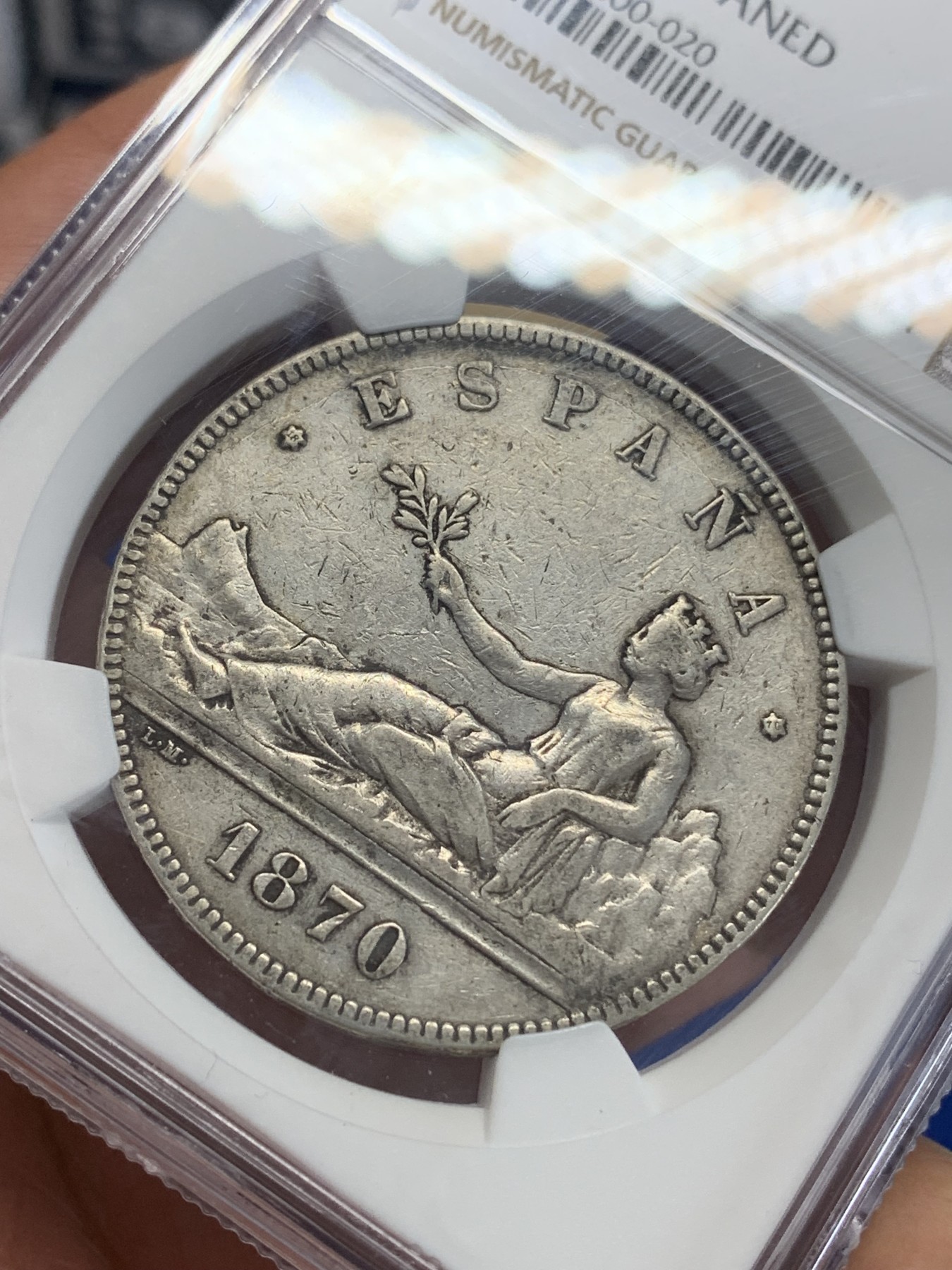 《竞宝斋》第198场-周日，周一 2场 (全场包邮) NGC VFD 西班牙1870年拿花女神5比塞塔双柱银币