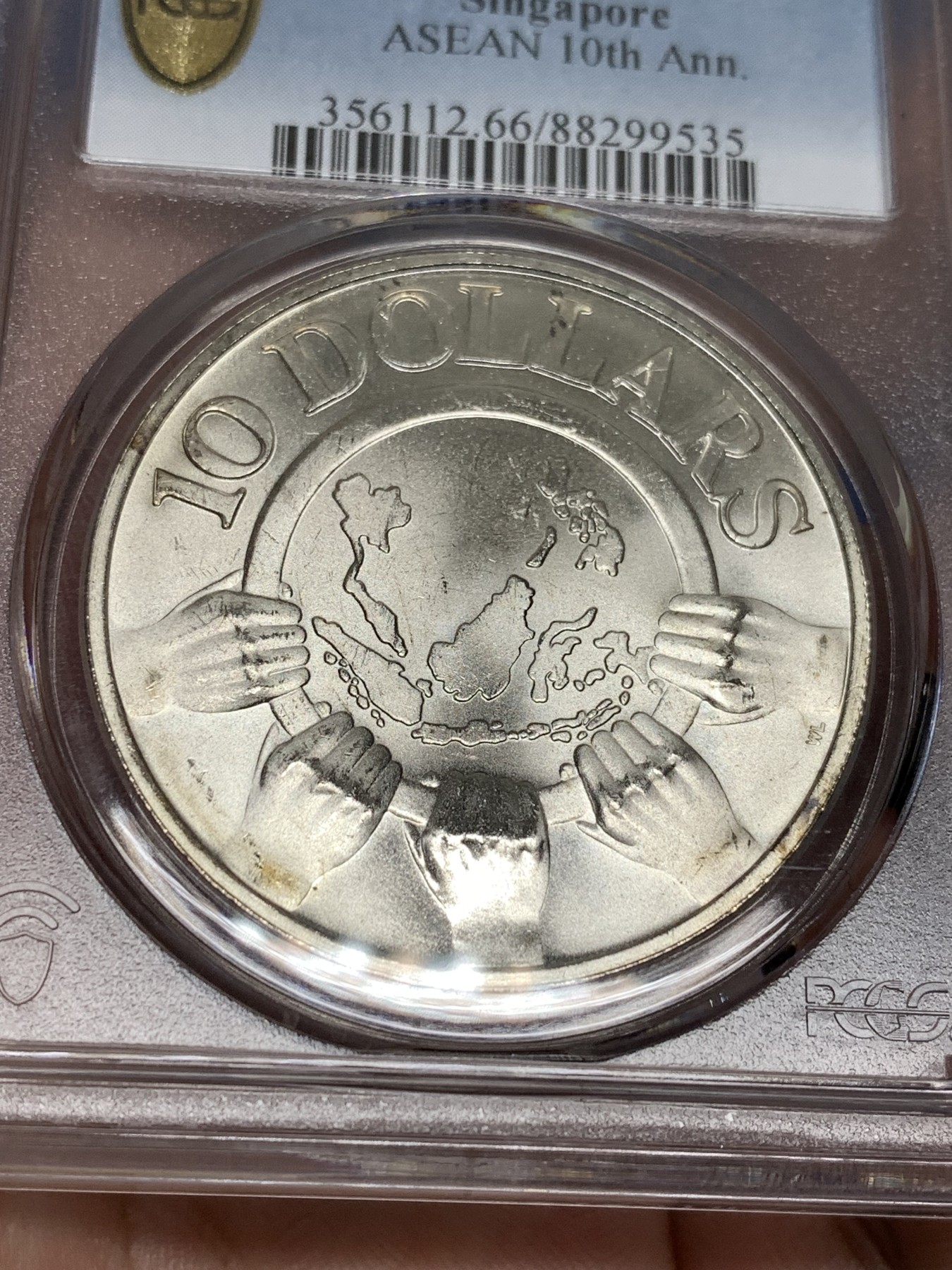《竞宝斋》第198场-周日，周一 2场 (全场包邮) PCGS MS66 1977新加坡东盟10周年银币 原光好品