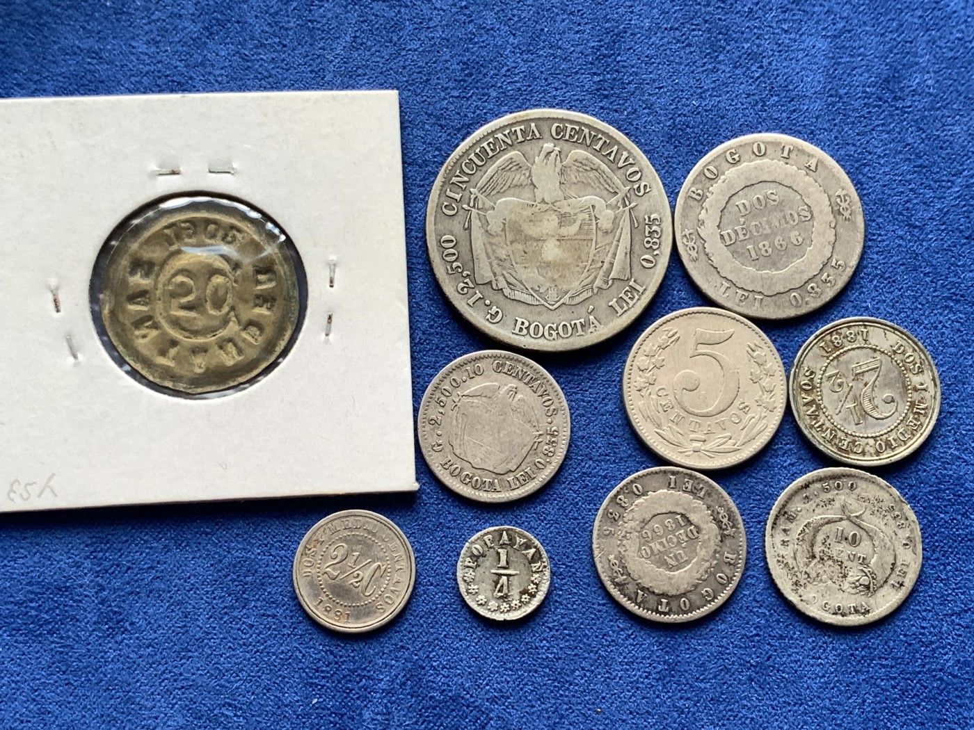 《竞宝斋》第198场-周日，周一 2场 (全场包邮) 10枚一组 哥伦比亚早期银币6枚+3枚铜镍（时期:1862-1908，5枚银币半打制其中一枚为打制银币）哥伦比亚早期的币国内稀少，喜欢的不要错过了。另外加一枚哥伦比亚桑坦德尔1902年打制50分代币  具体见图