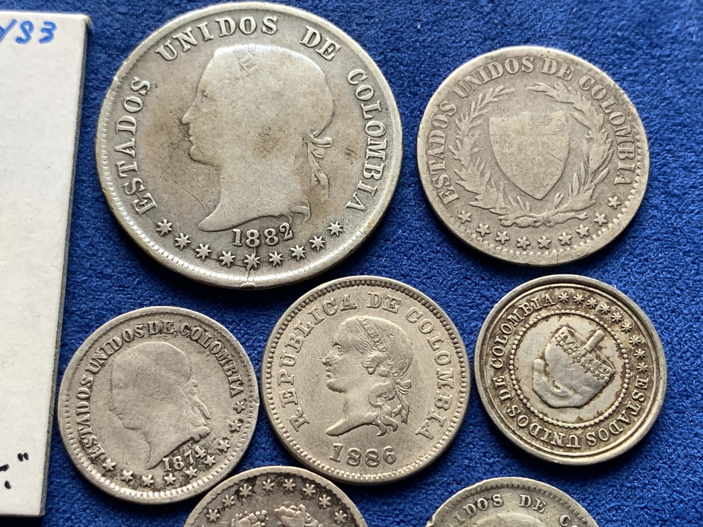 《竞宝斋》第198场-周日，周一 2场 (全场包邮) 10枚一组 哥伦比亚早期银币6枚+3枚铜镍（时期:1862-1908，5枚银币半打制其中一枚为打制银币）哥伦比亚早期的币国内稀少，喜欢的不要错过了。另外加一枚哥伦比亚桑坦德尔1902年打制50分代币  具体见图