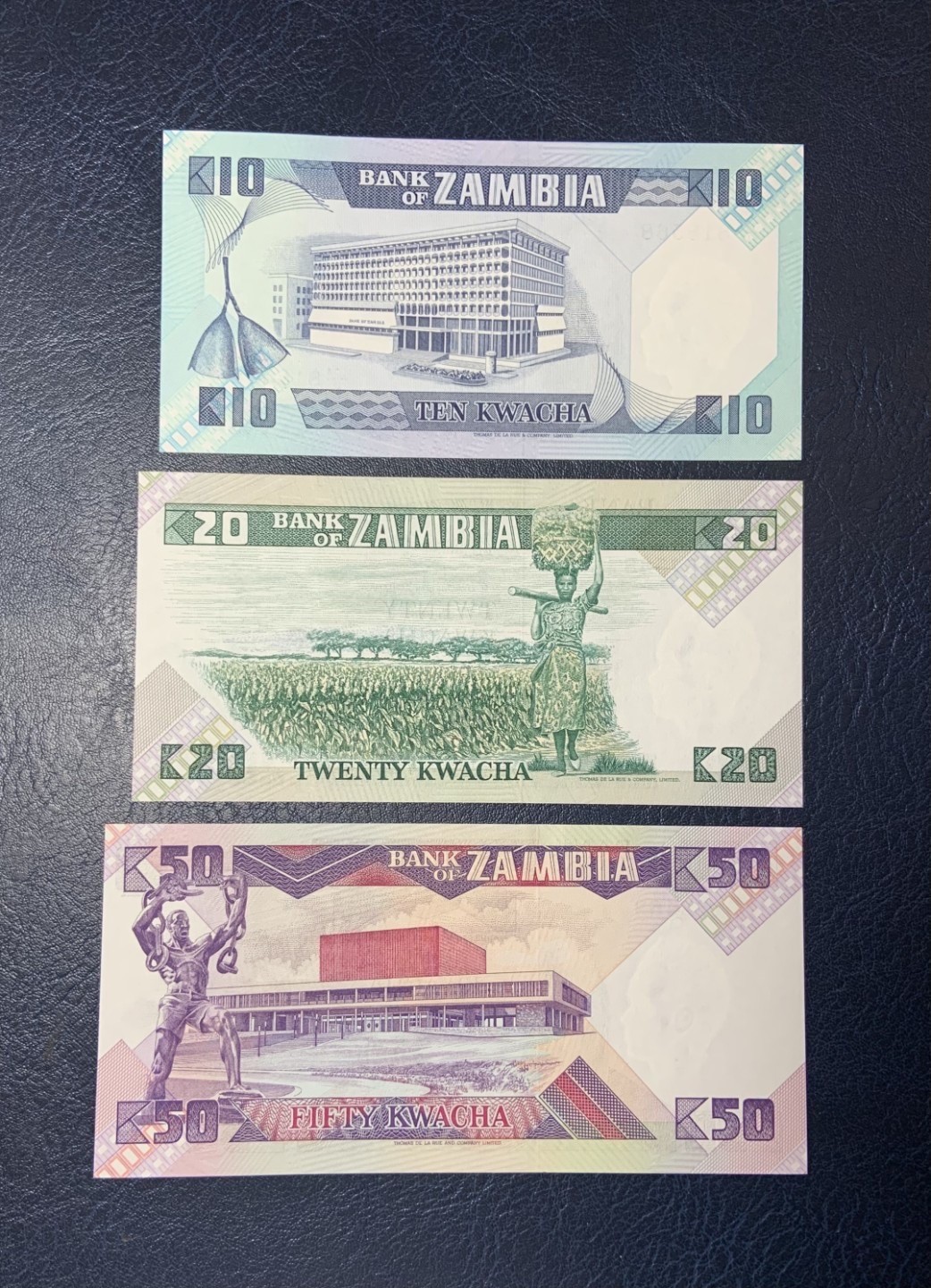 收藏联盟Quantum Auction 第290期拍卖  香港汇丰银行1995年10元和赞比亚1986-88年1-50克瓦查 品相全新UNC