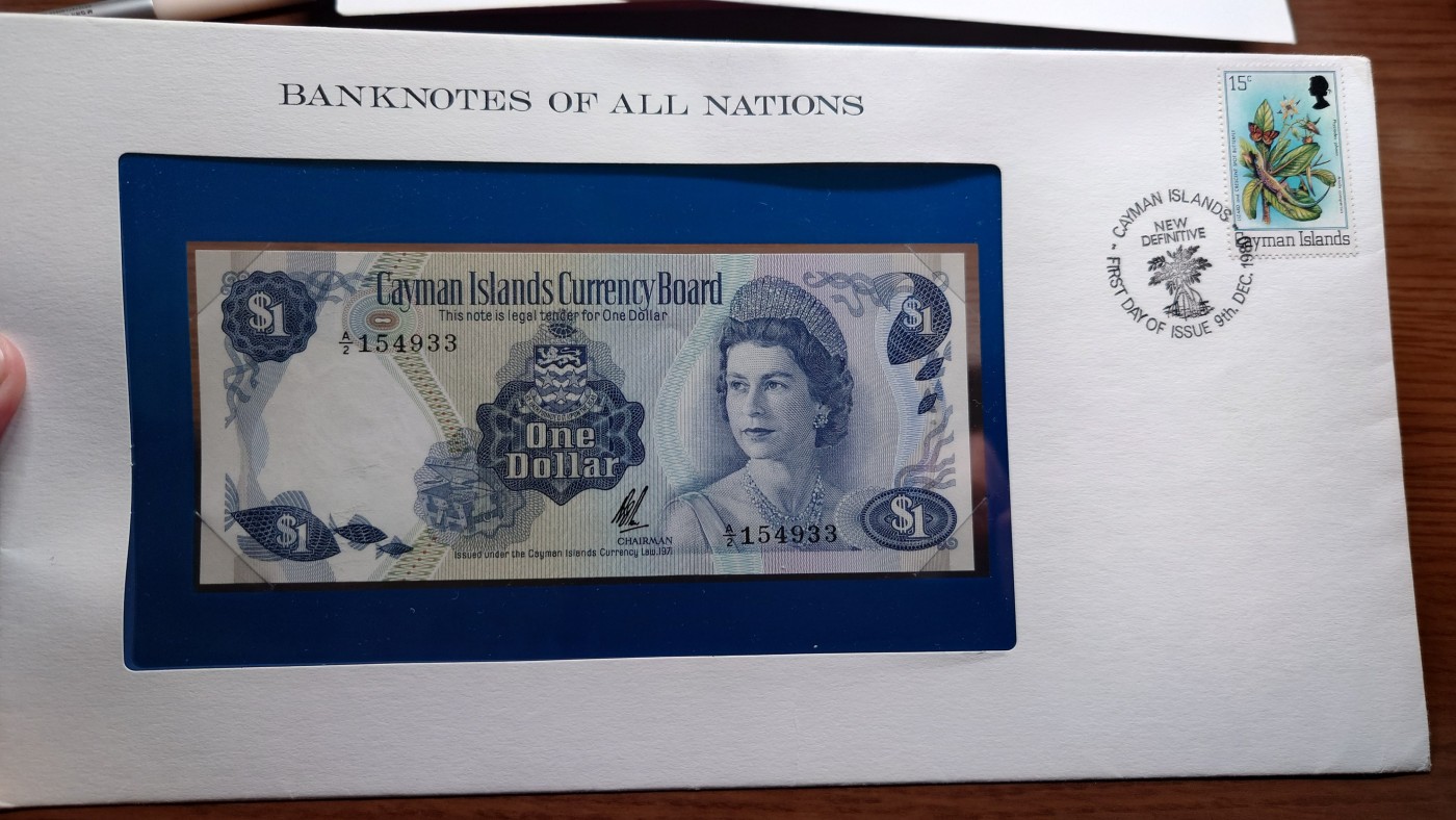陆续更新【世界钱币】精选微拍第73期暨2023年第二十期 全新纸质裸钞低价起拍(第二场) 1971年开曼群岛1元  富兰克林邮币封 全新