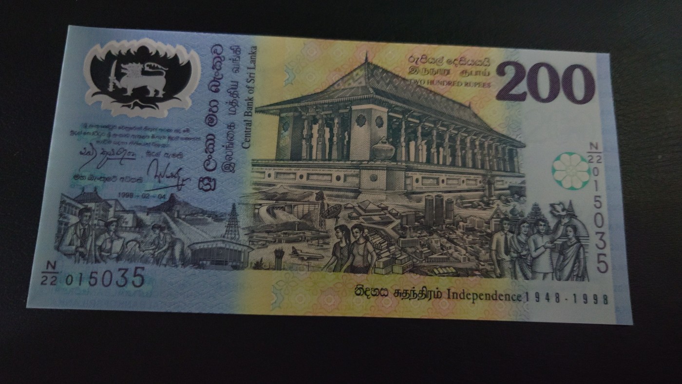 陆续更新【世界钱币】精选微拍第73期暨2023年第二十期 全新纸质裸钞低价起拍(第二场) 1998年斯里兰卡200 塑料纪念钞 全新绝品无47