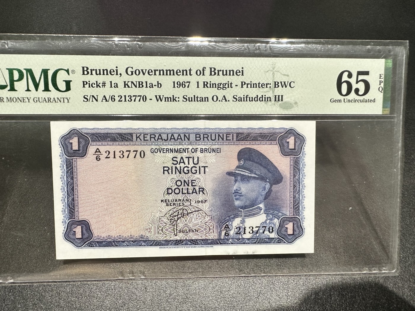 《外钞收藏家》第三百期 1967年文莱1林吉特 PMG65 BWC作品