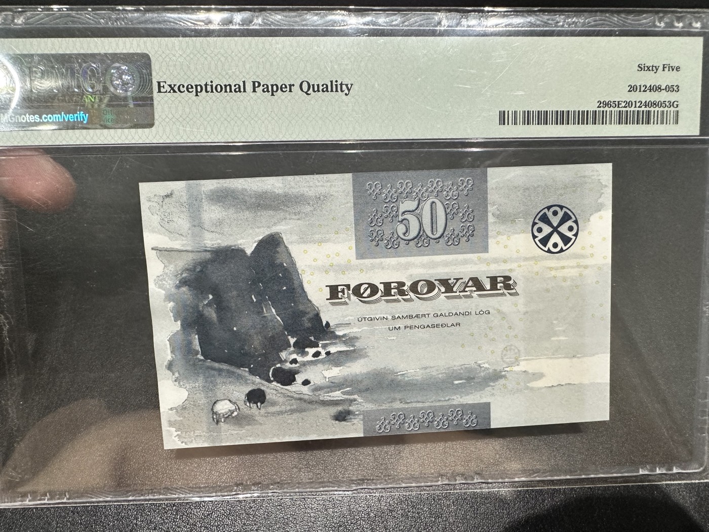 《外钞收藏家》第三百期 2011年法罗群岛50克朗 PMG65