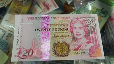 陆续更新【世界钱币】精选微拍第73期暨2023年第二十期 全新纸质裸钞低价起拍(第二场) - 2023年格恩西岛20镑 全新绝品无47尾号258