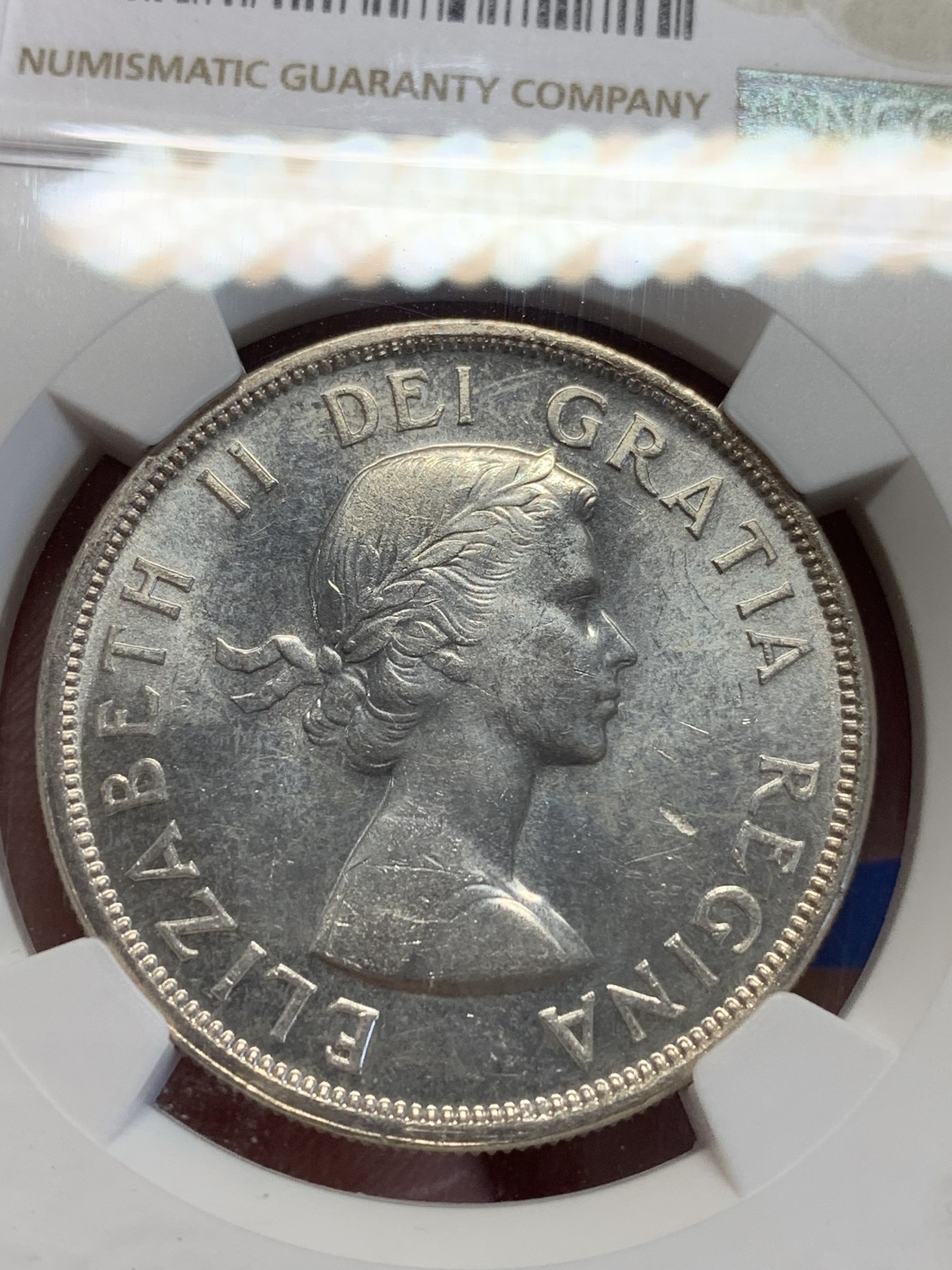 《竞宝斋》第201场-周日，周一 2场 (全场包邮) NGC MS64 1958年 加拿大 哥伦比亚百年纪念1元银币 高银版