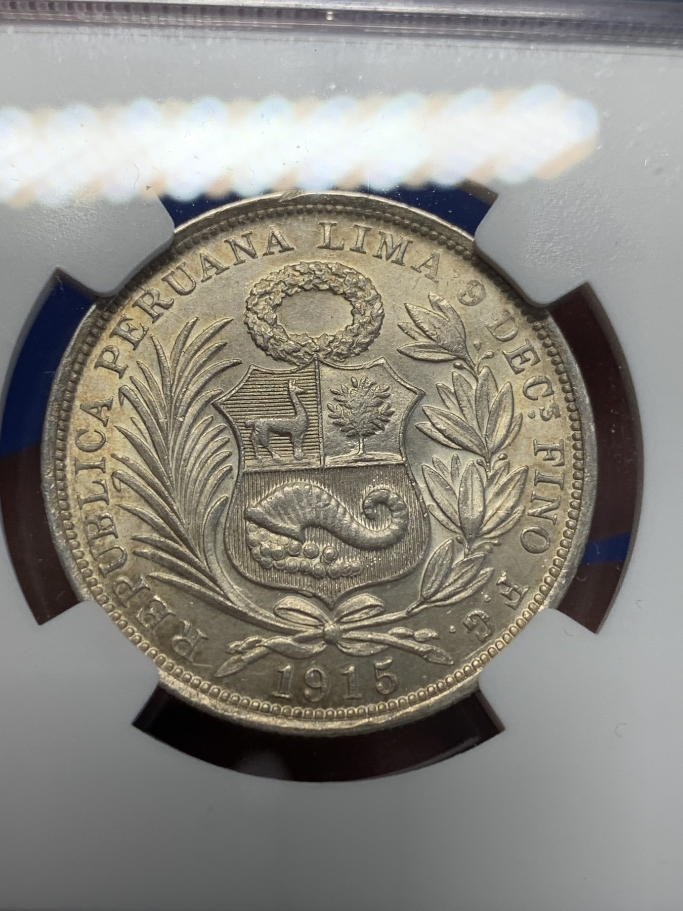 《竞宝斋》第201场-周日，周一 2场 (全场包邮) NGC MS62 秘鲁 1915年 1/2比索 银币 高银版 状态极好 包浆自然