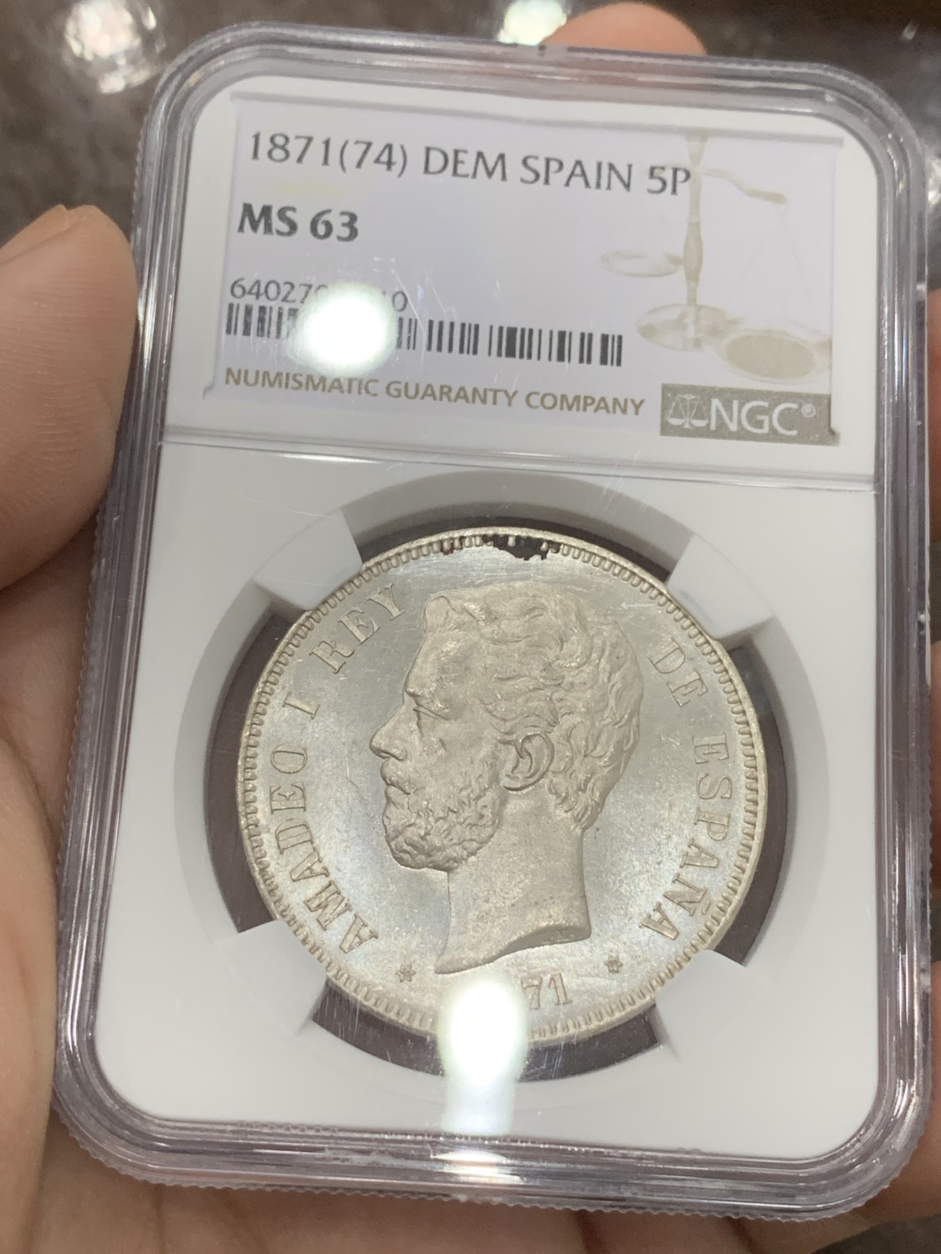 《竞宝斋》第201场-周日，周一 2场 (全场包邮) NGC-MS63 西班牙 1871(74) 阿马迪奥一世 5比塞塔双柱银币，比71的版本少很多，整体转光白净 稀缺品种高分难觅