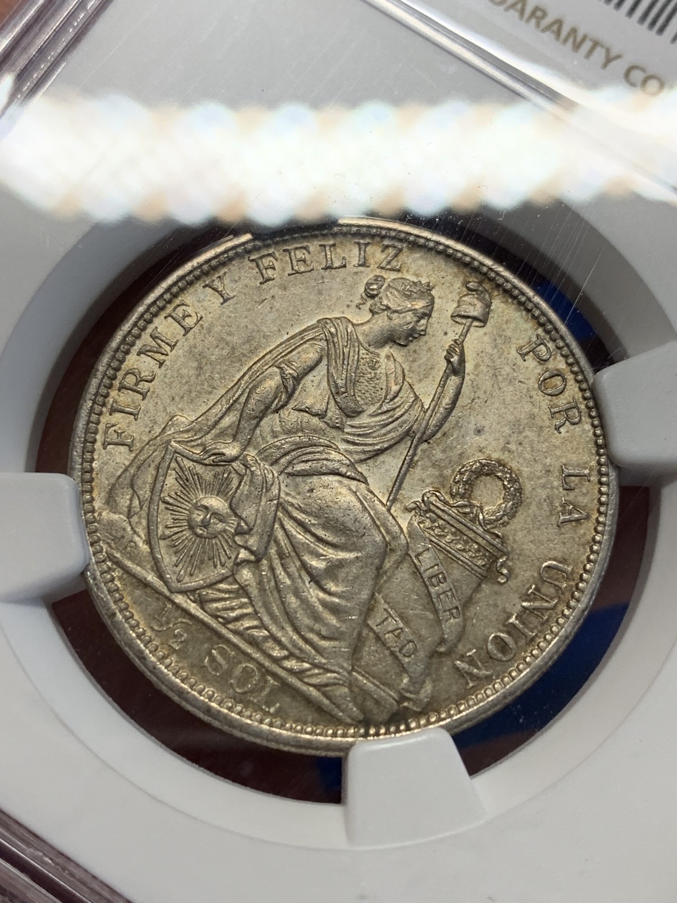 《竞宝斋》第201场-周日，周一 2场 (全场包邮) NGC MS62 秘鲁 1915年 1/2比索 银币 高银版 状态极好 包浆自然