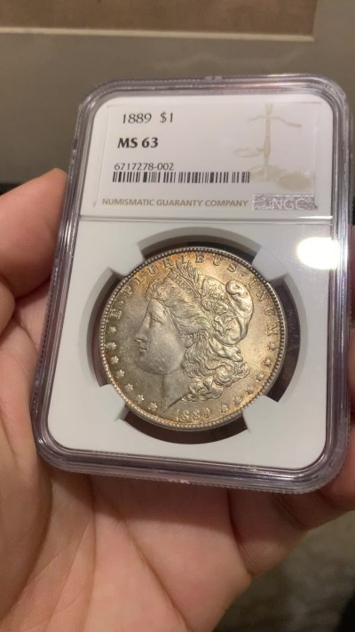 《竞宝斋》第201场-周日，周一 2场 (全场包邮) NGC-MS63 美国1889年摩根银币 五彩转光好状态