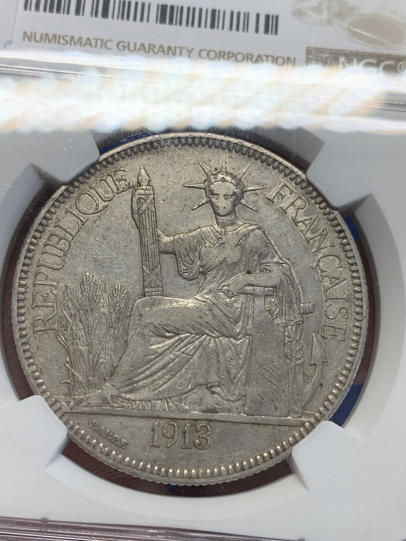 《竞宝斋》第201场-周日，周一 2场 (全场包邮) NGC AUD 法属印支1913A 坐洋1皮亚斯特银币 原味包浆 状态好