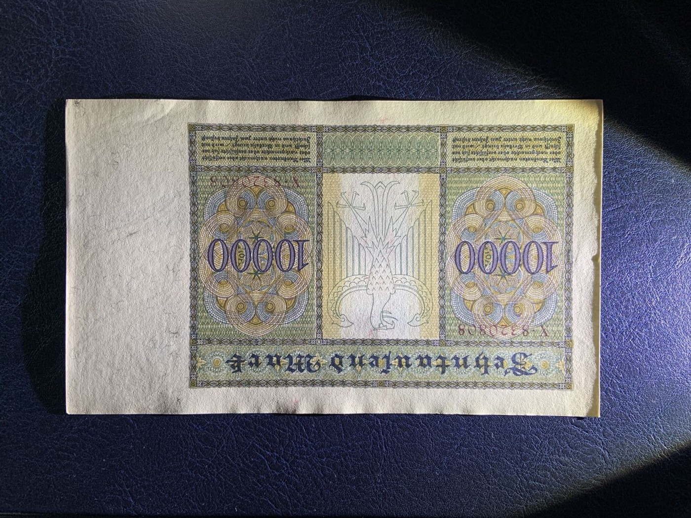 收藏联盟Quantum Auction 第292期拍卖  德国1922年10000马克红色库印大票幅版 品相UNC 边角瑕疵