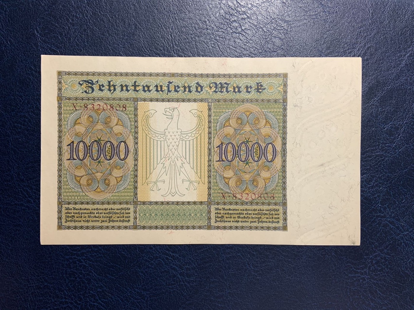 收藏联盟Quantum Auction 第292期拍卖  德国1922年10000马克红色库印大票幅版 品相UNC 边角瑕疵