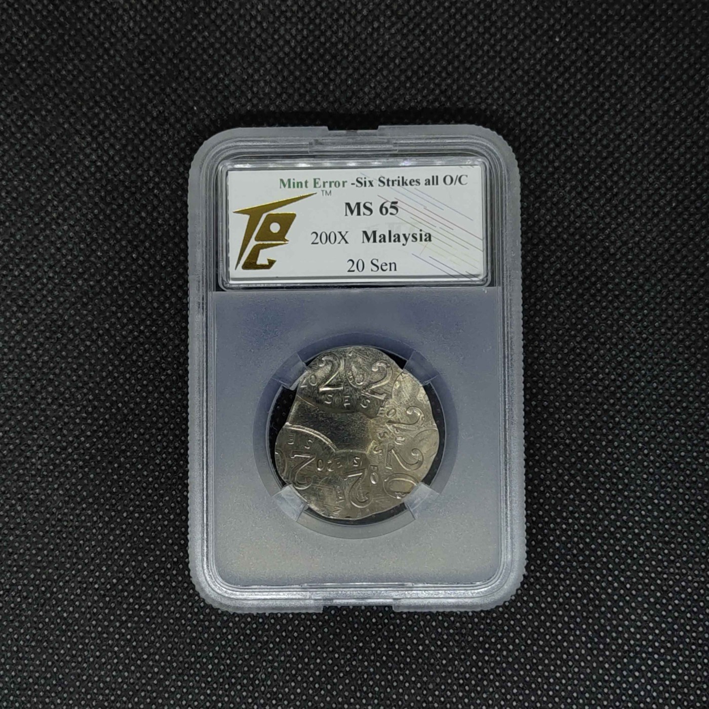 收藏联盟Quantum Auction 第292期拍卖  马来西亚200X年20仙多次压印错版币 TQG ms65
