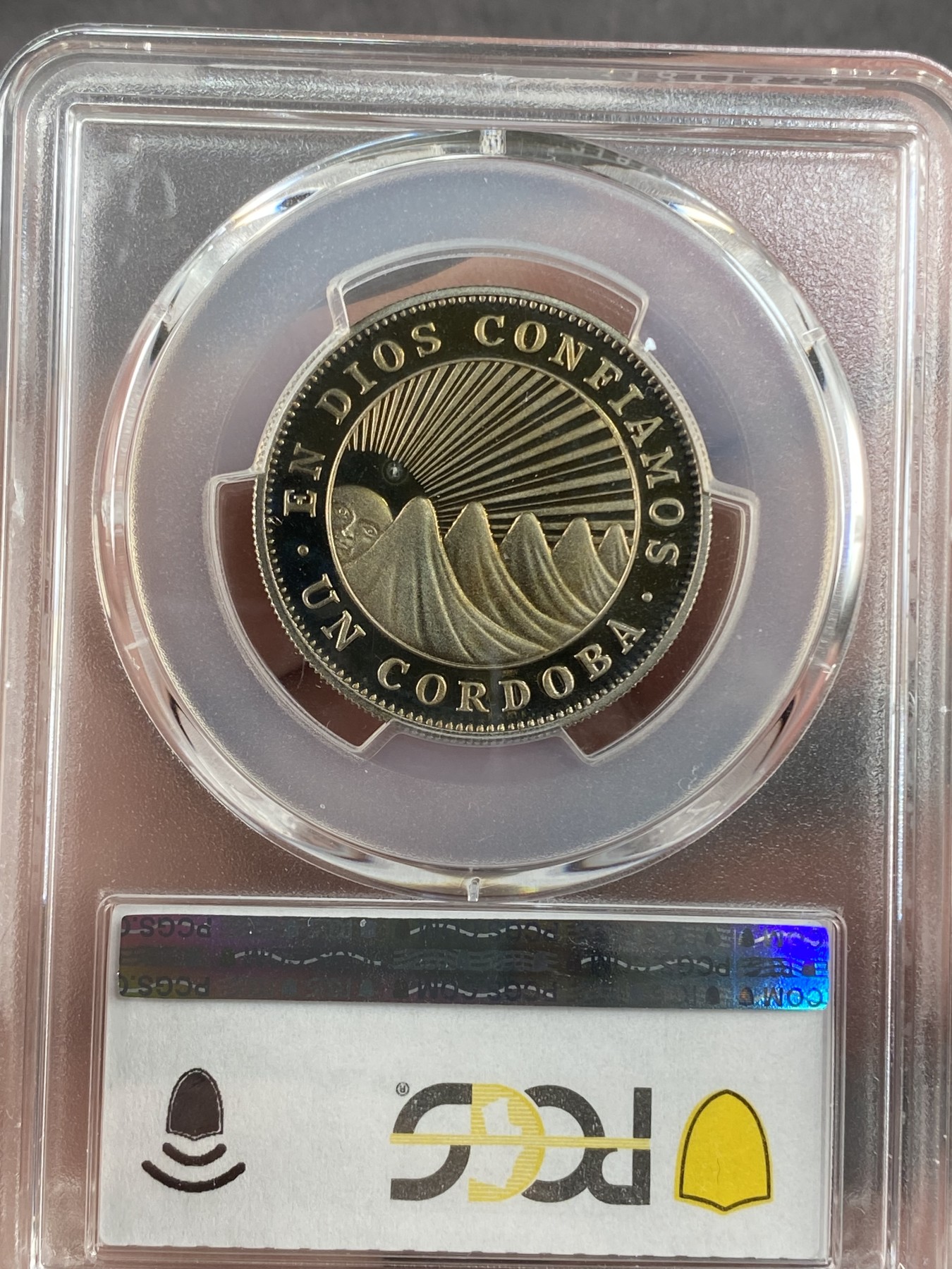 万国钱币拍卖第017期（中秋—国庆花好月圆夜特辑） PCGS PR68DCAM 1972年尼加拉瓜共和国精致镜面1科多巴 背面一处污迹