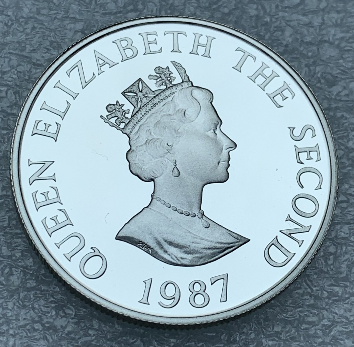 瓶子🏺第111期拍卖会 动物-粉鸽 泽西1986年2镑 精制纪念银币