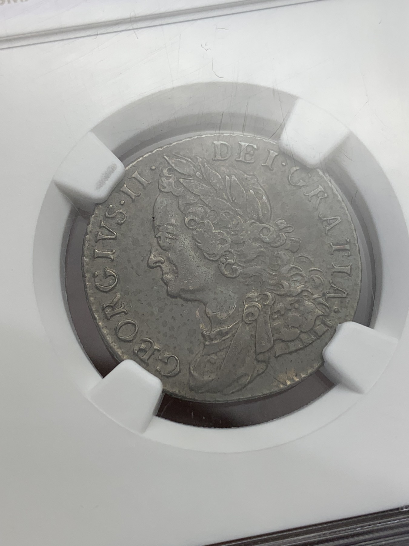 欢迎参加《竞宝斋》为国而庆 老张自藏专场 ，定制纪念章相赠 NGC AU50 英国 1758年 乔二 水泡眼 1先令 银币 原味深包浆 细节好