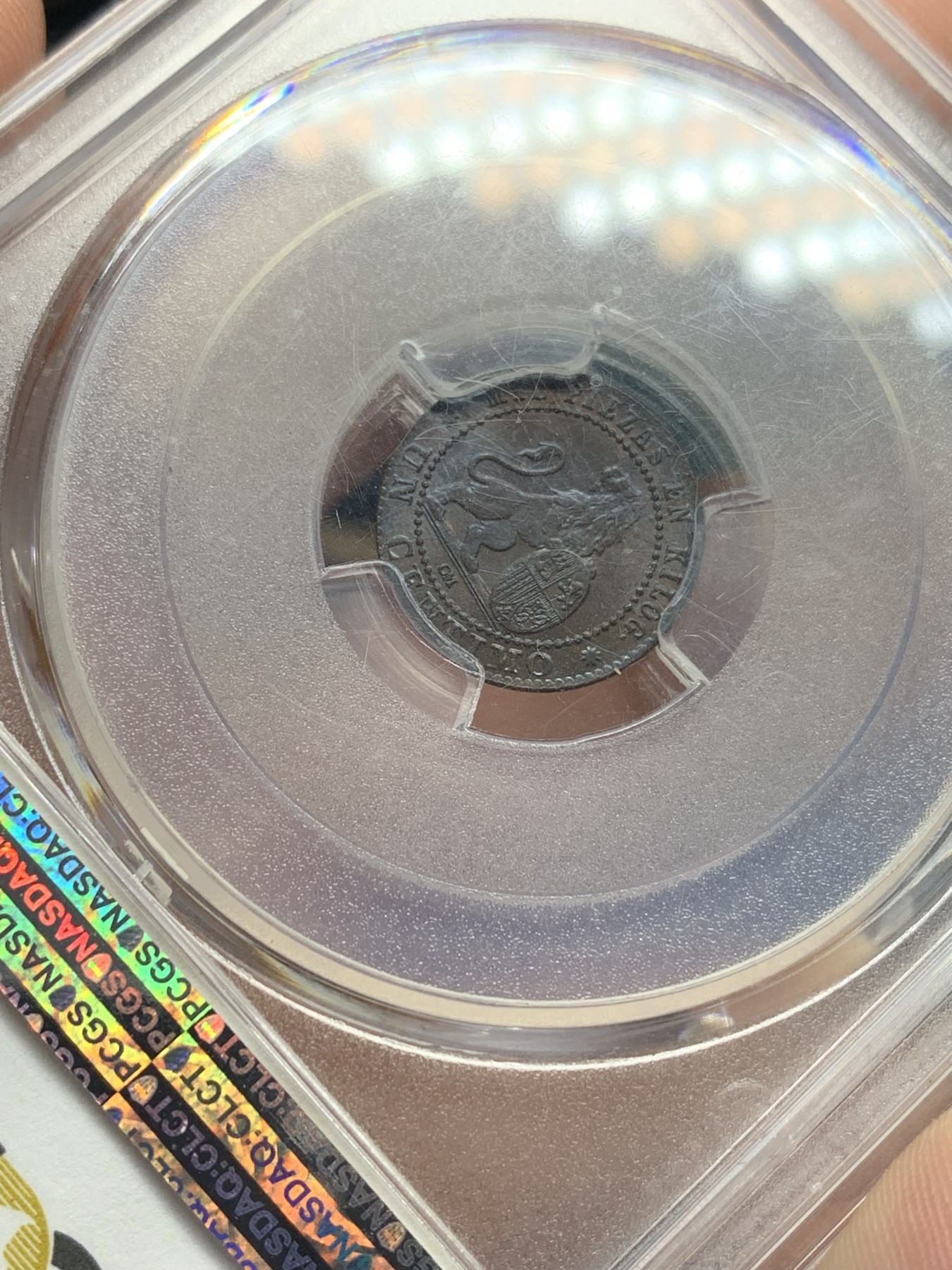 欢迎参加《竞宝斋》为国而庆 老张自藏专场 ，定制纪念章相赠 PCGS MS64BN 西班牙 1870年 坐人 狮子 1C 铜币 细节慢慢 状态极好