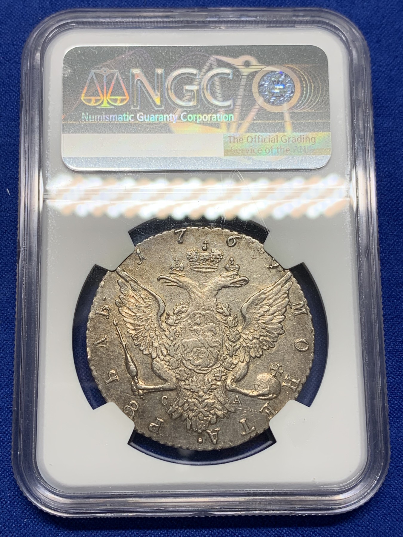 欢迎参加《竞宝斋》为国而庆 老张自藏专场 ，定制纪念章相赠 NGC AU 沙俄 叶卡捷琳娜二世 1769 1卢布银币 双面淡金包浆 底板光好 全深打 币胚完整 除了没给分 不输其它