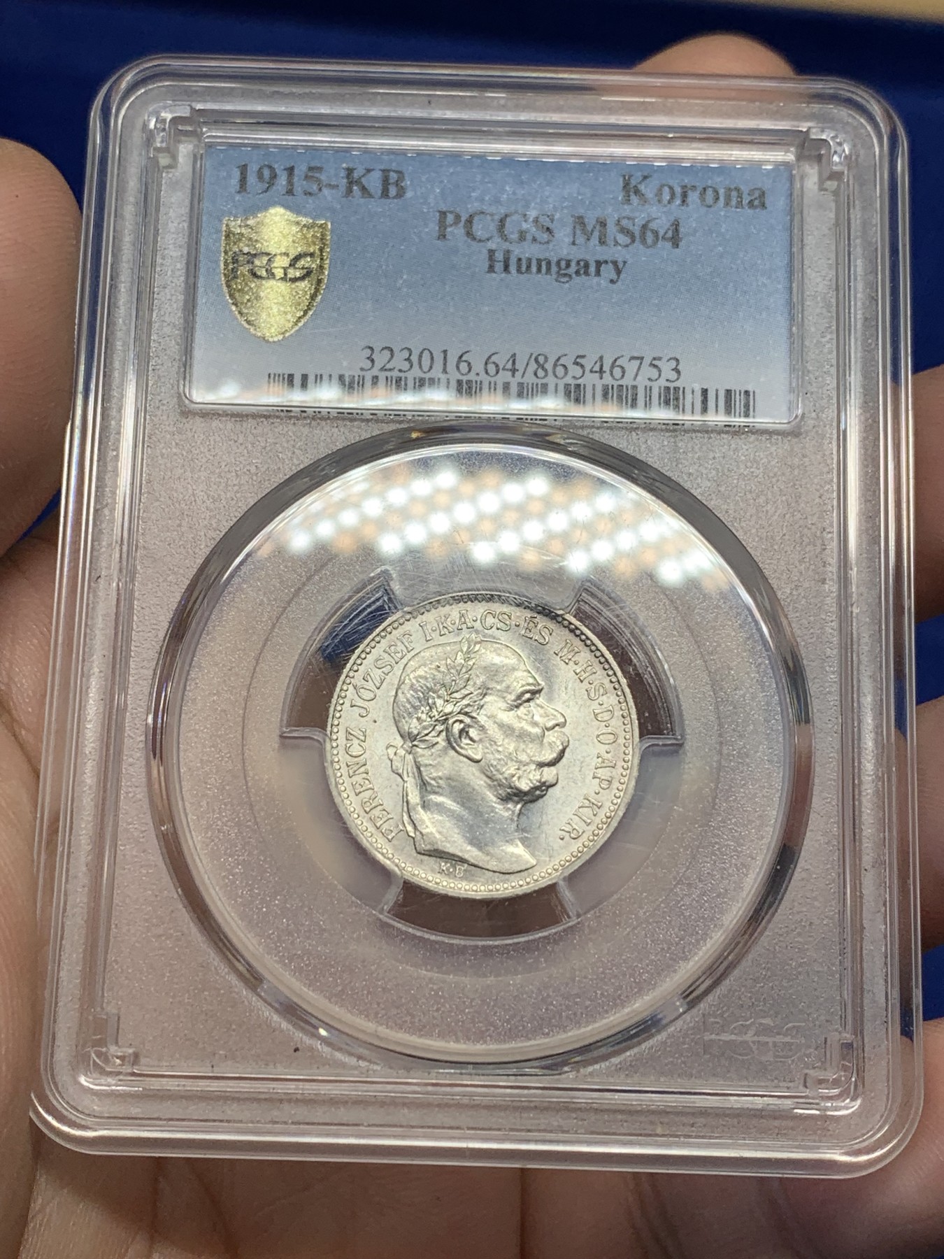 欢迎参加《竞宝斋》为国而庆 老张自藏专场 ，定制纪念章相赠 PCGS MS64 1915年奥匈帝国 匈牙利1克朗皇冠银币 状态没的说