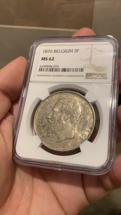 欢迎参加《竞宝斋》为国而庆 老张自藏专场 ，定制纪念章相赠 NGC MS62 比利时 1876年 5法郎银币 不多的年份 原味包浆 难得