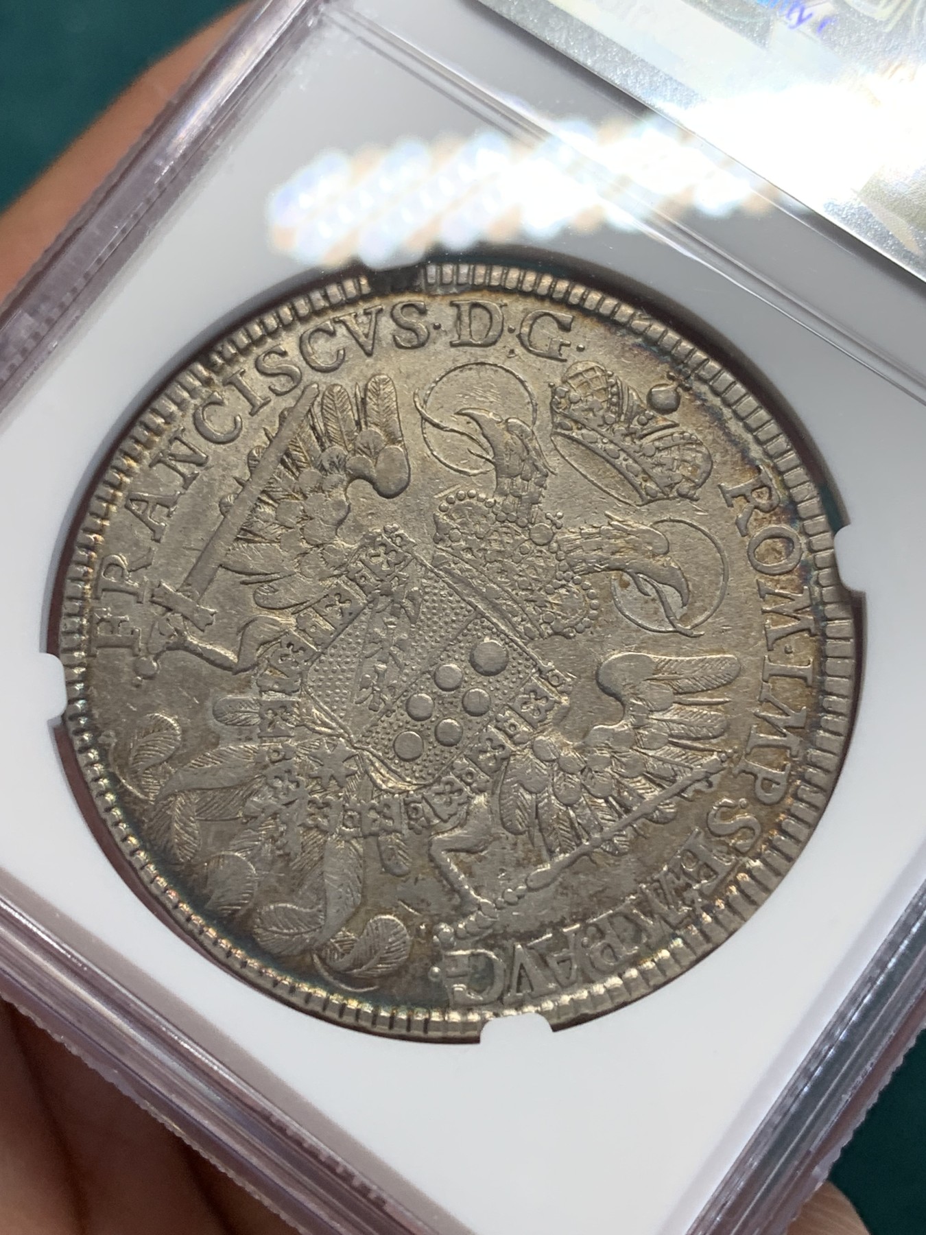 欢迎参加《竞宝斋》为国而庆 老张自藏专场 ，定制纪念章相赠 NGC XF 德国 纽伦堡 1765-SS 拿花 泰勒大银币 细节包浆都不错 性价比品种