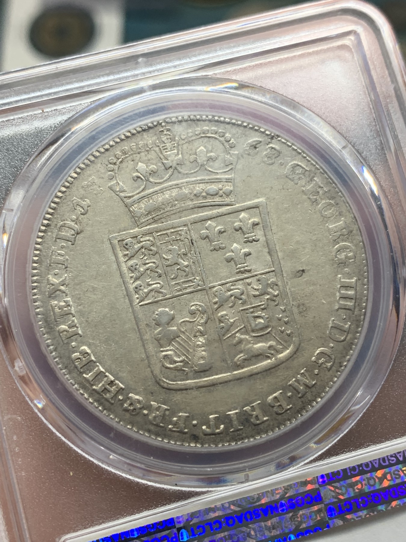 欢迎参加《竞宝斋》为国而庆 老张自藏专场 ，定制纪念章相赠 PCGS AU55 德国 布伦瑞克 1768年 泰勒银币 深打细节 人物鼻尖没有磨损