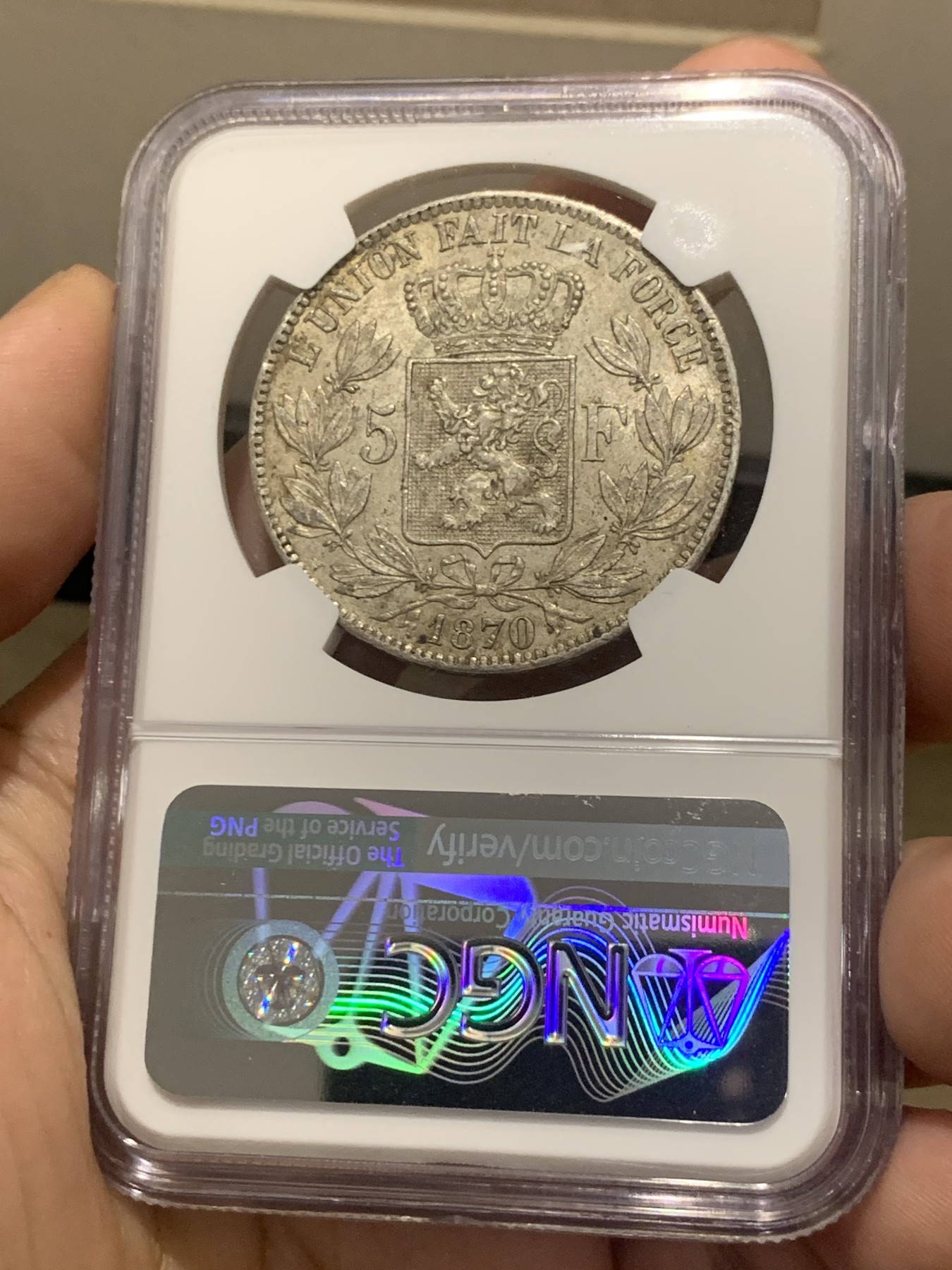 欢迎参加《竞宝斋》为国而庆 老张自藏专场 ，定制纪念章相赠 NGC MS63 比利时 1870年 5法郎银币 不是常见的1873年，63分已经很难遇到了