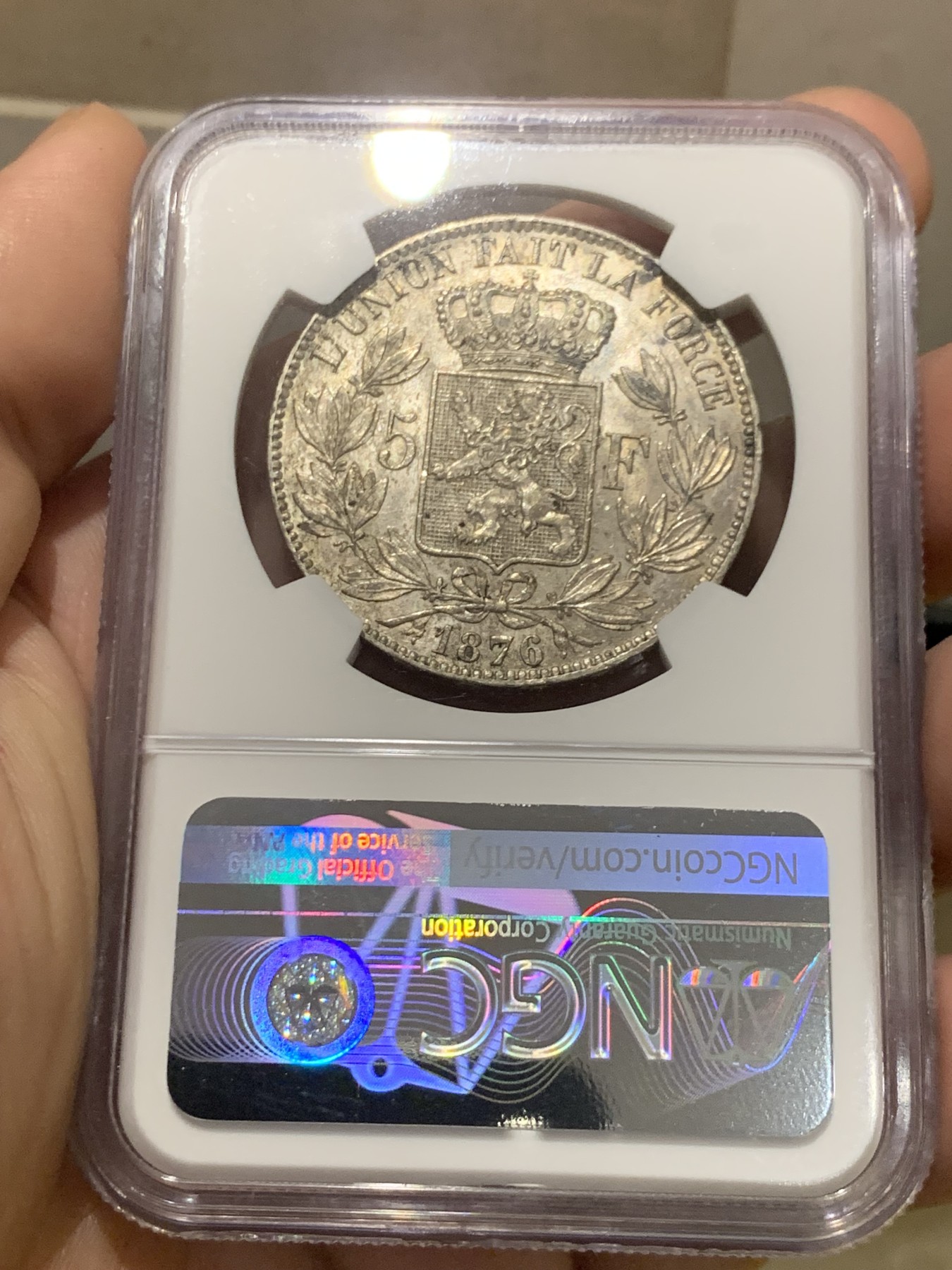 欢迎参加《竞宝斋》为国而庆 老张自藏专场 ，定制纪念章相赠 NGC MS62 比利时 1876年 5法郎银币 不多的年份 原味包浆 难得