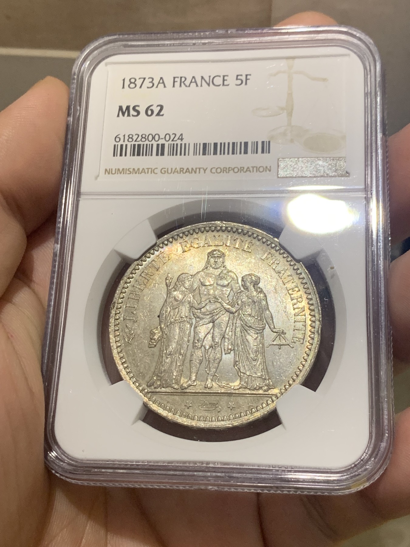 欢迎参加《竞宝斋》为国而庆 老张自藏专场 ，定制纪念章相赠 NGC MS62 法国 1873年 大力神5法郎银币 转光一流 62分中的战斗机