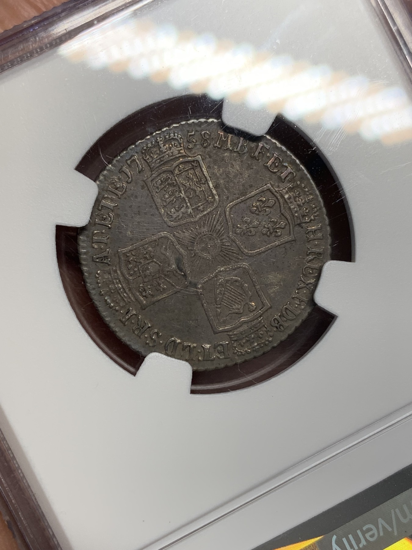 欢迎参加《竞宝斋》为国而庆 老张自藏专场 ，定制纪念章相赠 NGC AU50 英国 1758年 乔二 水泡眼 1先令 银币 原味深包浆 细节好