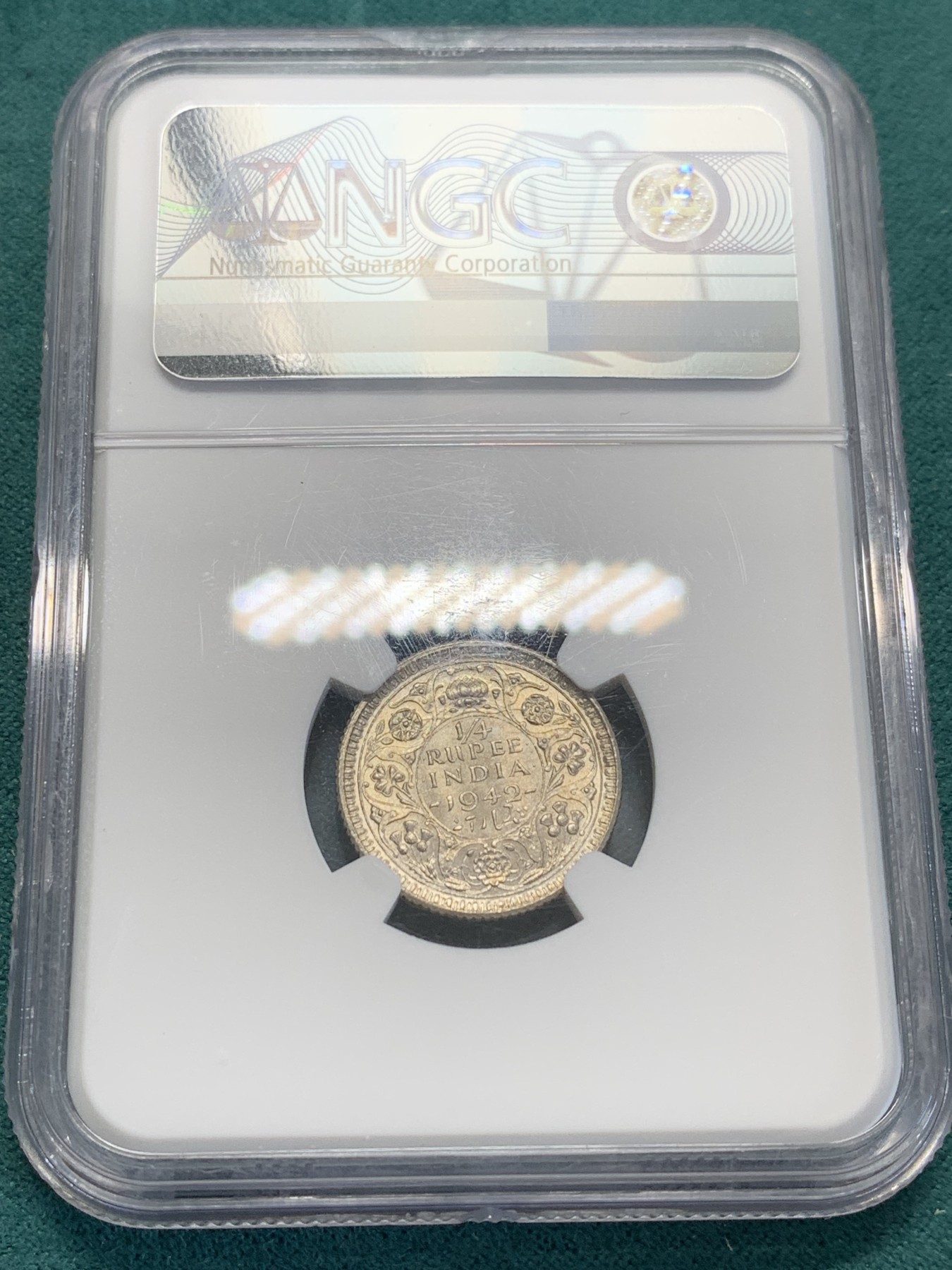 欢迎参加《竞宝斋》为国而庆 老张自藏专场 ，定制纪念章相赠 NGC MS63 英属印度 1942 乔六 1/4卢比银币 大面值常见 1/4的 流通大好品不容易