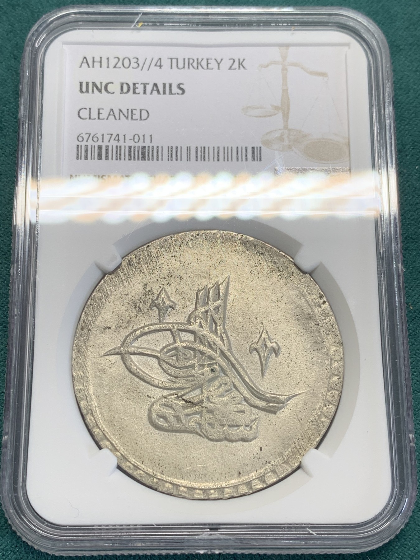 欢迎参加《竞宝斋》为国而庆 老张自藏专场 ，定制纪念章相赠 NGC-UNC 土耳其 奥斯曼帝国 1203  2库鲁什 大银币  打制光度都很足 N就是不给分 XFD都将近700成交了