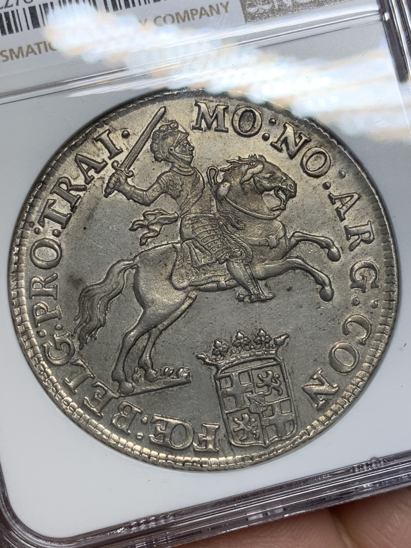 欢迎参加《竞宝斋》为国而庆 老张自藏专场 ，定制纪念章相赠 NGC AU58 荷兰 1791年 乌特勒支 骑士大马剑银币 32克多的大规格 细节极好 底光靓丽 58分中的战斗机