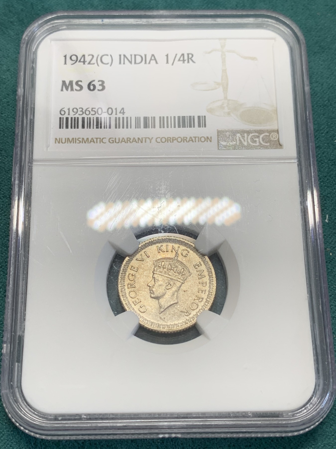 欢迎参加《竞宝斋》为国而庆 老张自藏专场 ，定制纪念章相赠 NGC MS63 英属印度 1942 乔六 1/4卢比银币 大面值常见 1/4的 流通大好品不容易